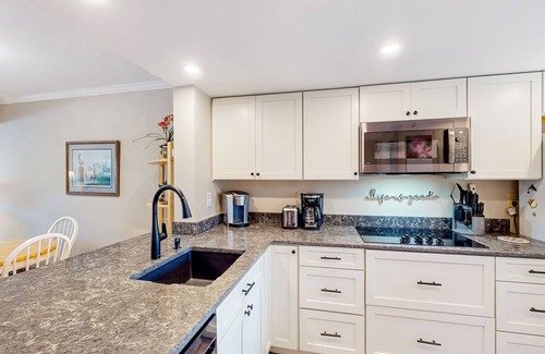 Hilton Head Island Condo | Fun & bright beach getaway with pool, easy beach access & pond view