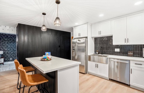 South Main House | Fun-Filled Backyard:Firepit-Grill-Games-Good Vibes