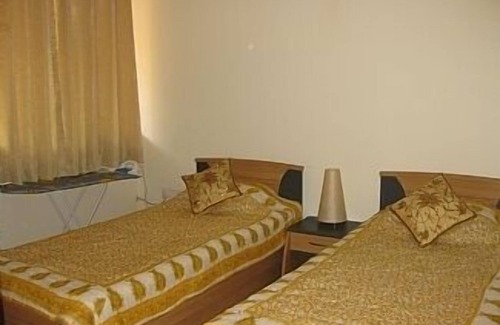 Candolim Apartment | Furnished Apartment In Regal Park With Serene Pool And Garden Views