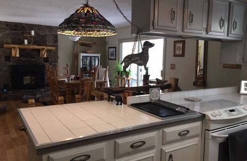Woodland Park Bed & Breakfast | Furnished Bedroom in our Home with Queen bed - Shared Bath