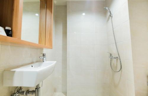 Cikarang Apartment | Furnished Studio No Kitchen Apartment Mustika Golf Residence By Travelio