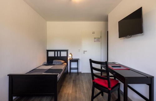 Schortens Apartment | Gästehaus Olympia Wilhelmshaven - Moderne Einzelzimmer mit eigenem Bad für Monteure
