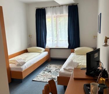 Munchen District Hotel | Gästezimmer im Trenner