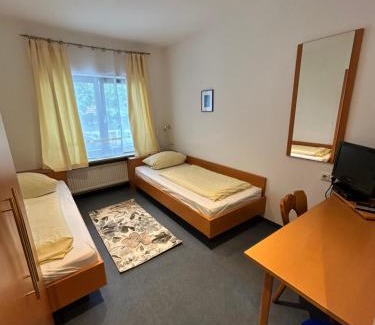 Munchen District Hotel | Gästezimmer im Trenner