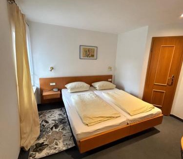 Munchen District Hotel | Gästezimmer im Trenner