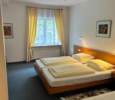 Munchen District Hotel | Gästezimmer im Trenner