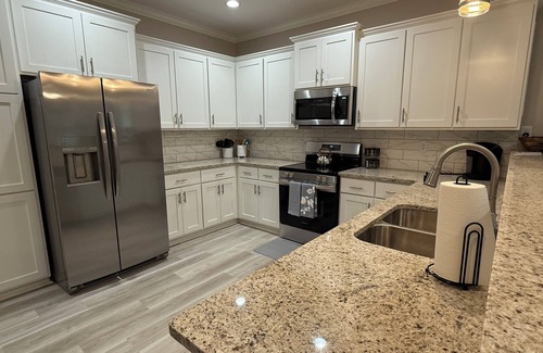Searcy House | Galloway Place: a spacious 3-bedroom, 2-bath home that sleeps six.