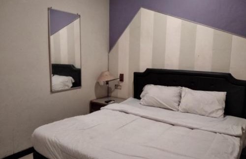 Surabaya Hotel | Gangnam Style Residence Mitra RedDoorz near MERR Surabaya
