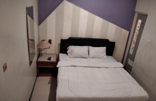 Surabaya Hotel | Gangnam Style Residence Mitra RedDoorz near MERR Surabaya