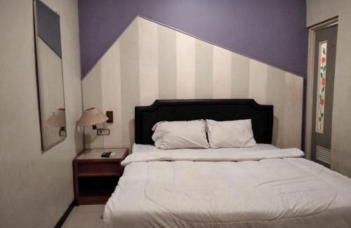 Surabaya Hotel | Gangnam Style Residence Mitra RedDoorz near MERR Surabaya