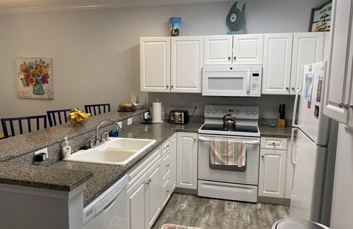 North Myrtle Beach Condo | Gated 3 BR Condo pool view, easy walk to Beach, Restaurants & Main St.