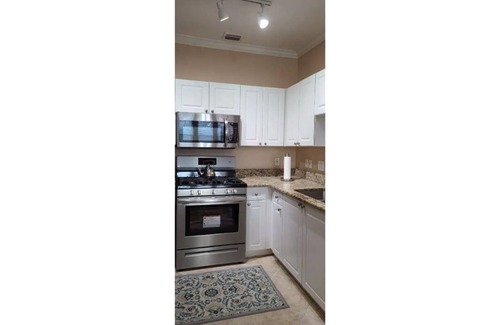 Clearwater House | Gated community Tampa Bay waters surrounding the area Outdoor swimming pool. Gym