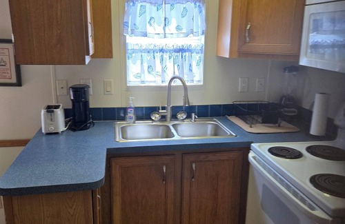 Upper Grand Lagoon Cottage | Gated. great for families and winter guests Other units inquire if unit booked
