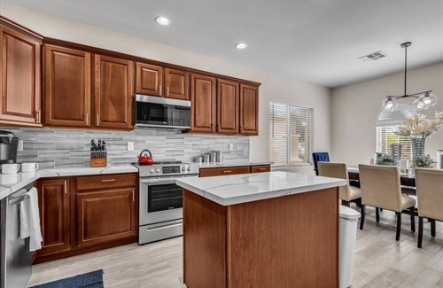 Chandler House | Gated Lake Community - 3 Bedroom Remodeled Home with a Heated Pool
