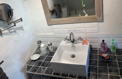 Argyle Apartment | Secluded romantic getaway with the turquoise Caribbean sea just steps away.