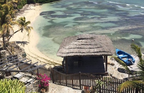 Argyle Apartment | Secluded romantic getaway with the turquoise Caribbean sea just steps away.
