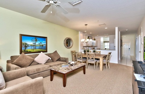 Naples Condo | Genoa Vacation Rental: Stylish 2-BR Condo with Golf & Lake Views. Resort-Style Pool, Hot Tub, and Easy Access to Championship Golf. Minutes from Naples Beaches, 5th Avenue S, and Marco Island