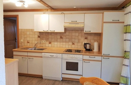 Zandt Apartment | Geräumige FeWo (115 m2) mit Balkon und Garten - perfekt für Ihren Familienurlaub!
