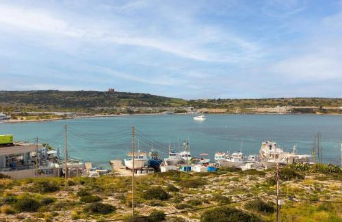 Għadira Apartment | Ghadirabay Seafront With Sea Views By Homely