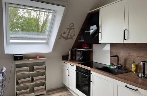 Eilsum Apartment | Giebelträumchen - Nagelneue und Hochwertige Ferienwohnung Direkt am Wasser!