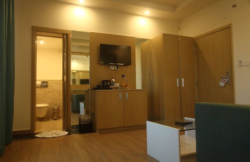 Shenoys Hotel | Ginger Kochi MG Road