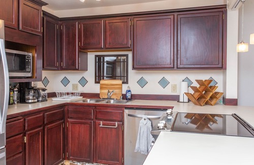 Alyeska Condo | Girdwood condo w/wood-burning fireplace & balcony w/mtn views - walk to lifts