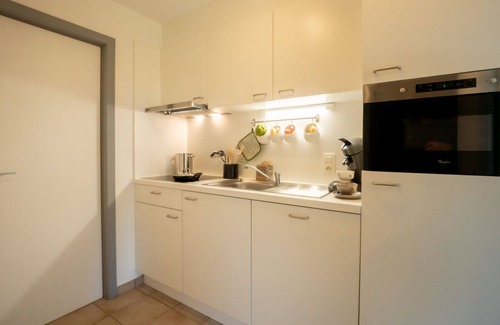 De Haan Apartment | Giuliott with parking and shared pool by Interhome