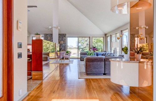 Sagaponack House | Glam-style home with private pool, open-floor plan, floor-to-ceiling.