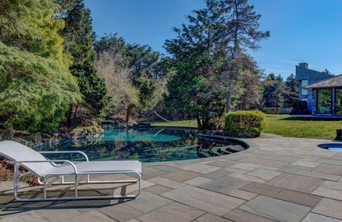 Sagaponack House | Glam-style home with private pool, open-floor plan, floor-to-ceiling.