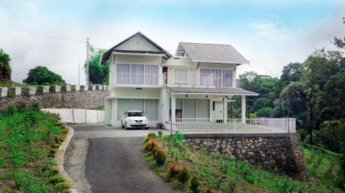 Elappara House | Glashaus by Izan