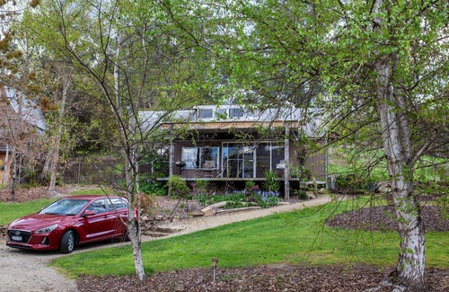 Tawonga South Ski Chalet | Glasshouse with log fire | pool | spa | near Bright | walk to shops restaurants