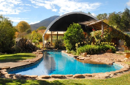 Tawonga South Ski Chalet | Glasshouse with log fire | pool | spa | near Bright | walk to shops restaurants