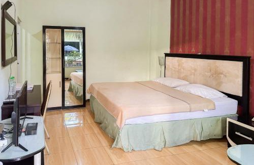 Sedati Hotel | Global Inn Syariah Mitra RedDoorz near Juanda T1 Airport
