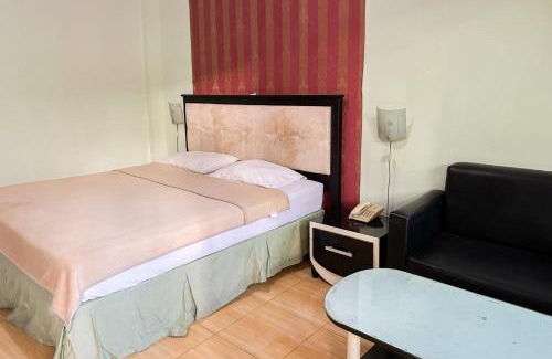 Sedati Hotel | Global Inn Syariah Mitra RedDoorz near Juanda T1 Airport