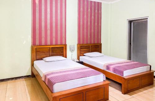 Sedati Hotel | Global Inn Syariah Mitra RedDoorz near Juanda T1 Airport