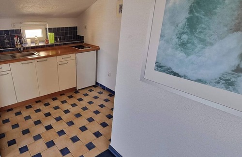 Obrovac Apartment | GMZ beachfront 3-bedroom apartment, shaded front yard in lovely Susnjar, Croatia