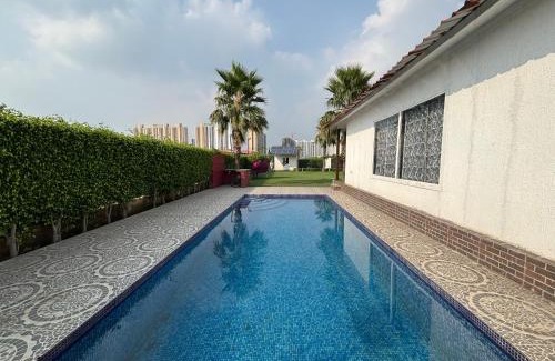 Noida House | GoBravo 48 -2BHK Farm with Pool & Lawn Sector 150 Noida