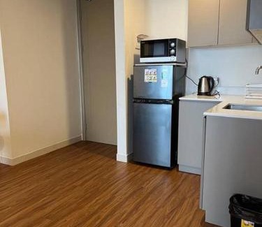 Jakarta Apartment | gold coast Italian room 1br sofa bed netflix