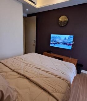 Pantai Indah Kapuk Apartment | gold coast studio Netflix wifi paris room sofabed