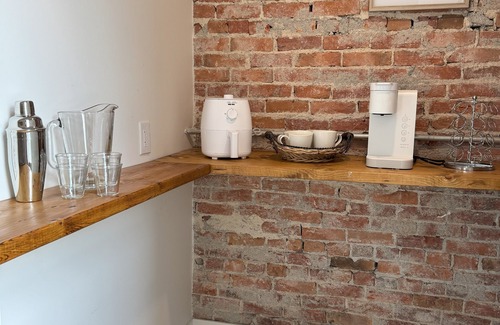 Harwich Apartment | Golden Acre Suites | 3BR Downtown Loft w/Exposed Brick & Urban Charm