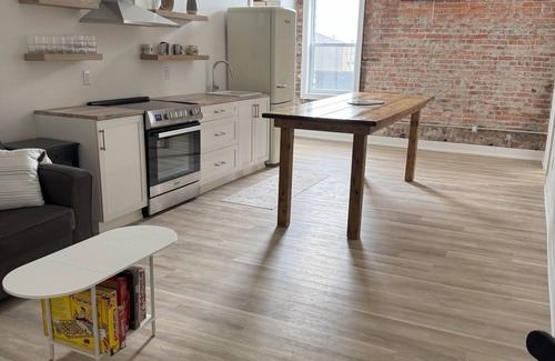 Harwich Apartment | Golden Acre Suites | 3BR Downtown Loft w/Exposed Brick & Urban Charm