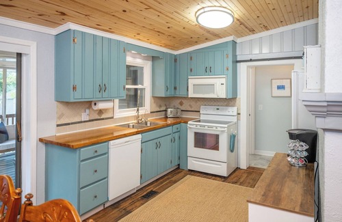 Yaupon Beach Cottage | GOLF CART Included Oak Island Cottage - Pet-friendly, Fire Pit, Porch, Sleeps 8