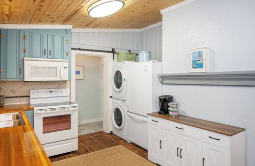 Yaupon Beach Cottage | GOLF CART Included Oak Island Cottage - Pet-friendly, Fire Pit, Porch, Sleeps 8