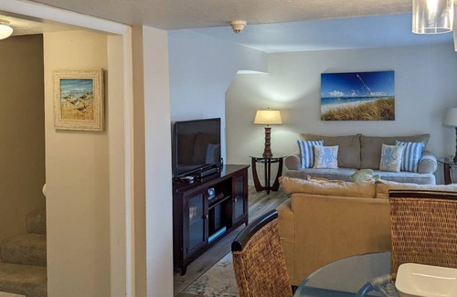 Sunnyside Condo | Gone Coastal Condo- Beach Front!