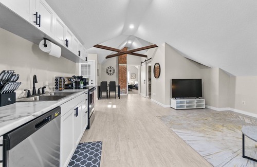 West Central Apartment | Gorg Wooden Beams w/Brick Accents in Downtown Apt