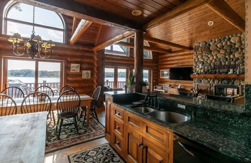 Wautoma Cabin | Gorgeous 7 bdrm loglodge fireplaces sauna hottub kayaks paddleboards boats