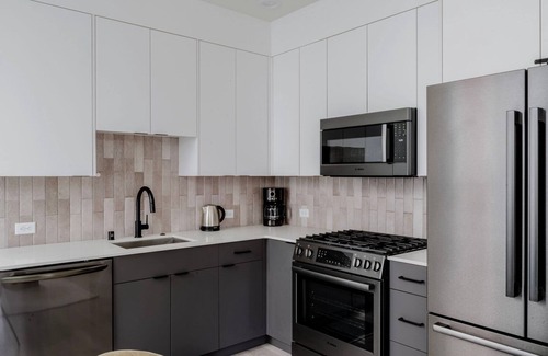 West Woodland House | Gorgeous Ballard 2BR w/Rooftop Patio, near Shops & Food, by Blueground