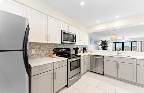 Cocoa Beach Condo | Gorgeous Beach Condo Balcony, Heated Pool, Tennis Court & Family Fun