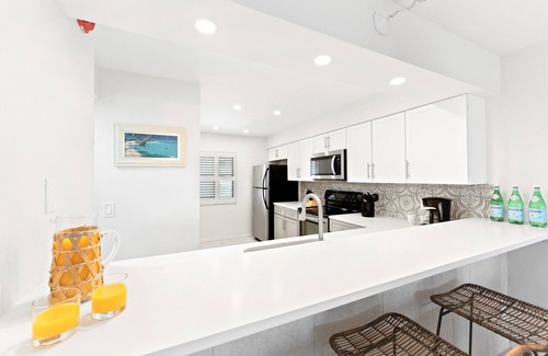 Cocoa Beach Condo | Gorgeous Beach Condo Balcony, Heated Pool, Tennis Court & Family Fun