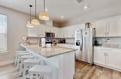 Orange Beach House | Gorgeous beach house with private pool, outdoor TV & custom grill area
